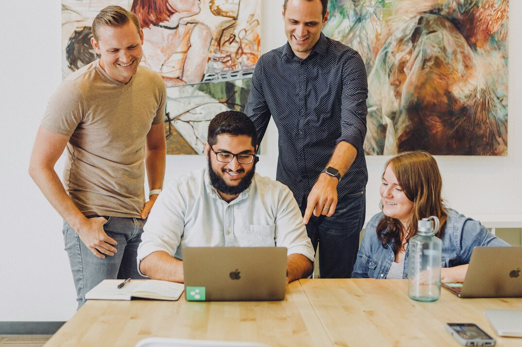 team discussing work habits