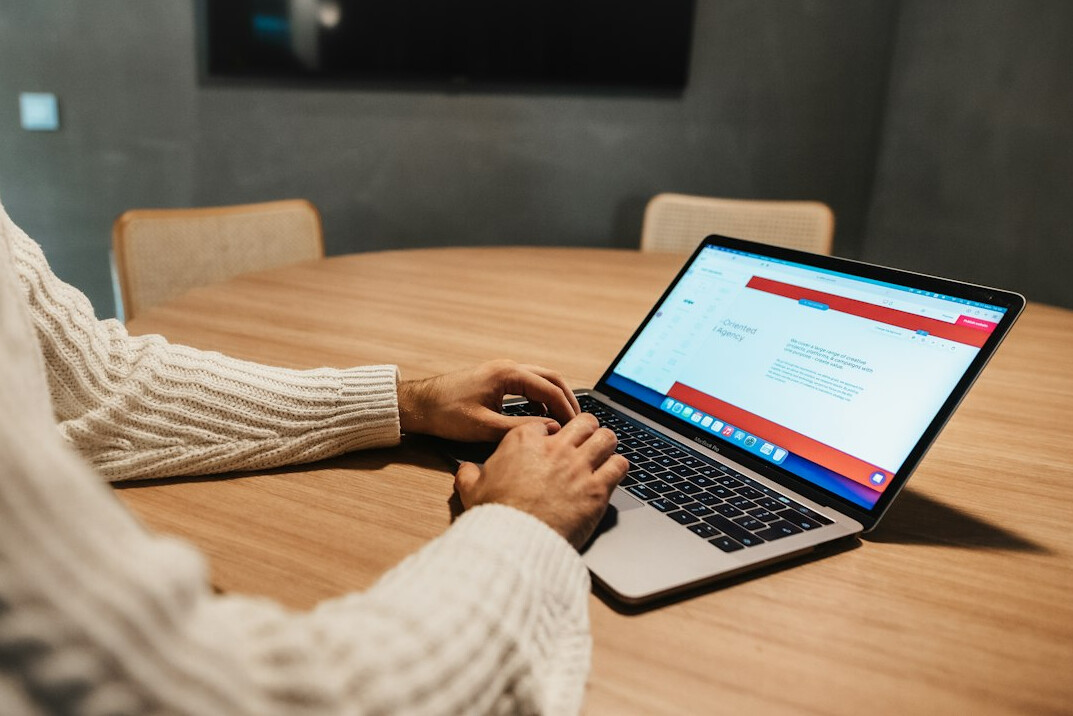 person reviewing work schedule on computer
