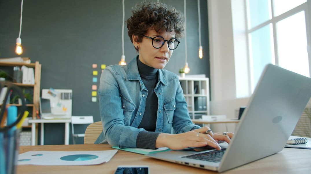 focused person working at desk