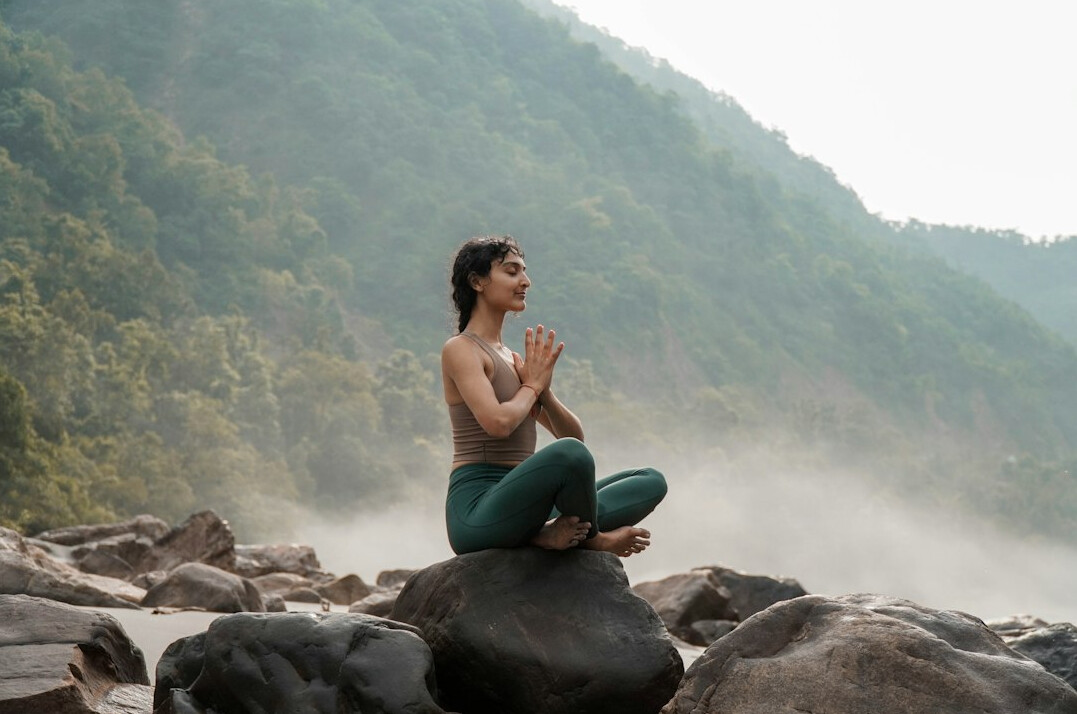 person meditating for balance