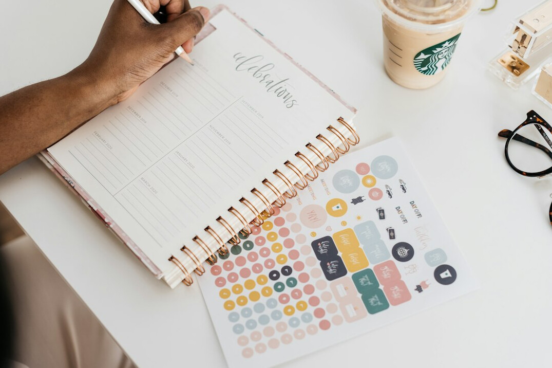 person reviewing calendar and notes